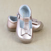 L'Amour Girls Rosegold Metallic Pebbled Leather Stitched Bow T-Strap Mary Jane - Petitfoot.com